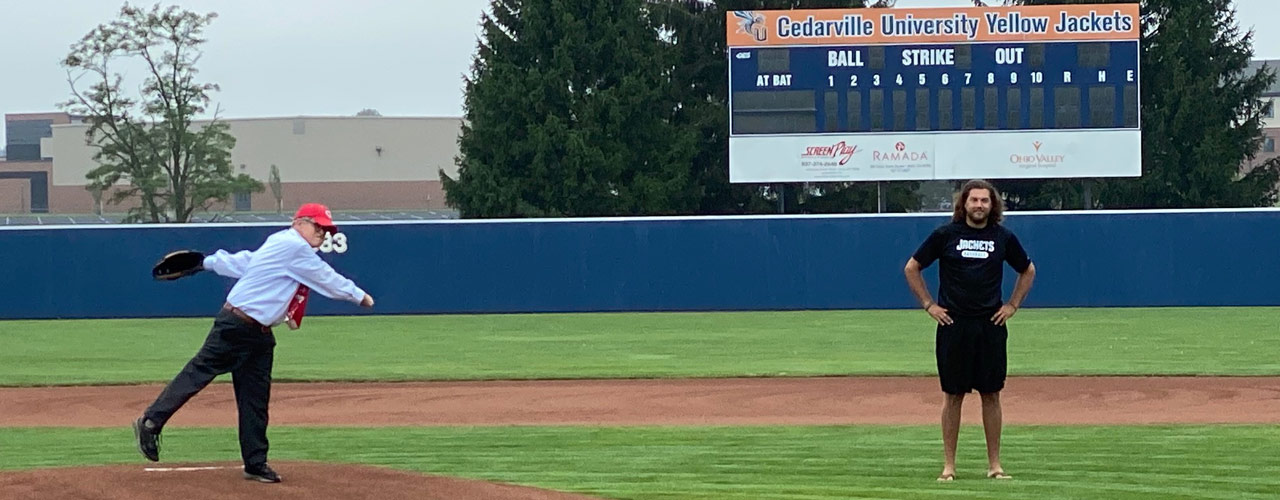 Gov. Mike DeWine throwing a pitch