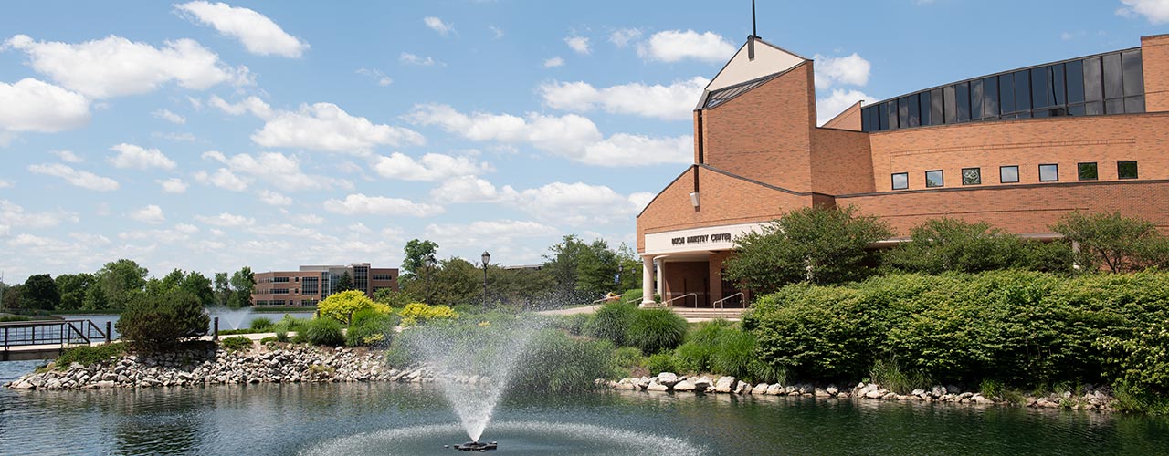 Dixon Ministry Center with fountain spraying water in foreground