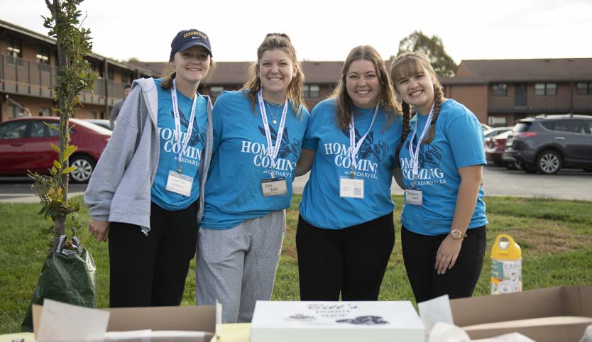 Students helping during homecoming weekend