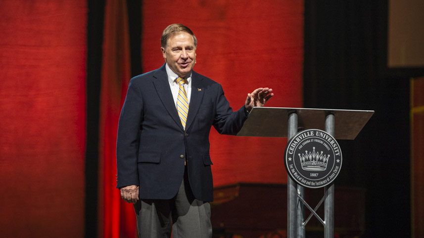 Jim Phipps speaking at a podium.