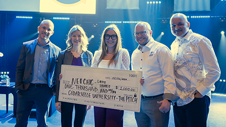 Lainy Humes with the pitch judges and check