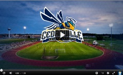 Yellow Jacket in front of track